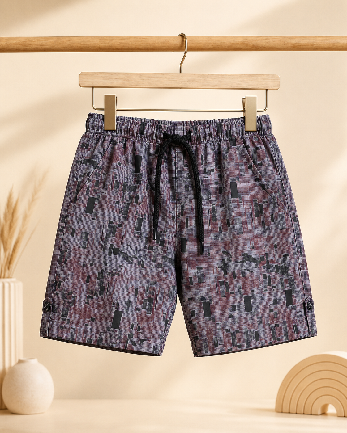Boys abstract print shorts - front view on hanger