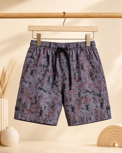 Boys abstract print shorts - front view on hanger