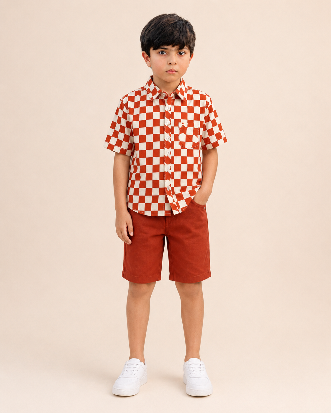 Boys rust cream checkerboard shirt and shorts co-ord set - full outfit on model